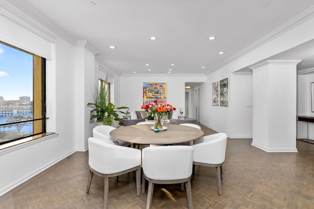 dining area featuring ornamental molding and parquet floors