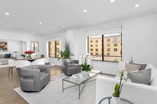 living room featuring ornamental molding and light parquet flooring