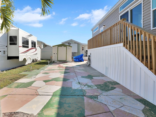 view of patio / terrace featuring a shed