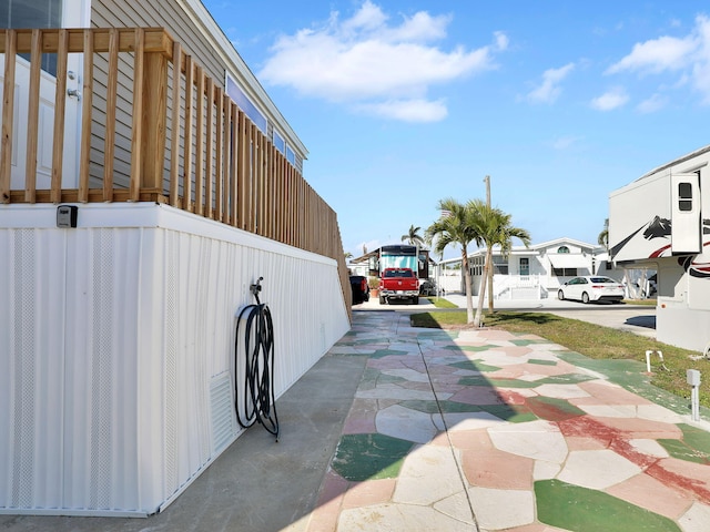 view of home's exterior with a patio area