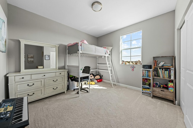 bedroom featuring light colored carpet