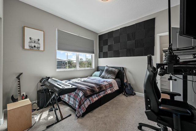 bedroom featuring light colored carpet