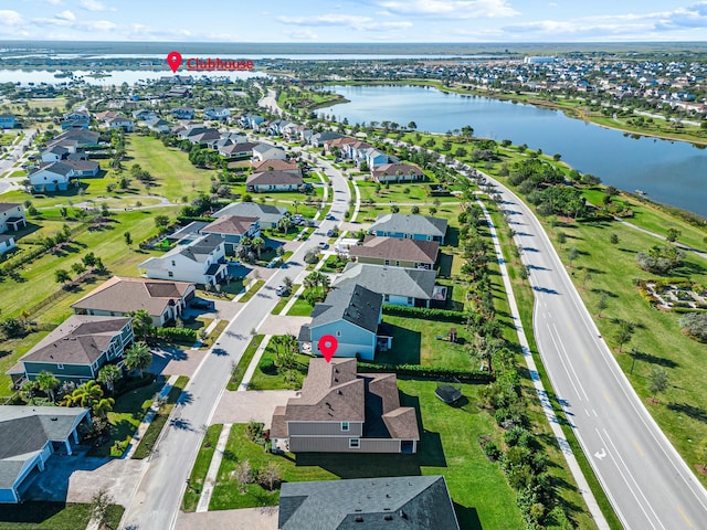 drone / aerial view with a water view