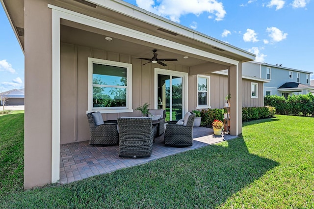 view of patio featuring ceiling fan