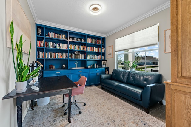 home office featuring crown molding, tile patterned floors, and built in shelves