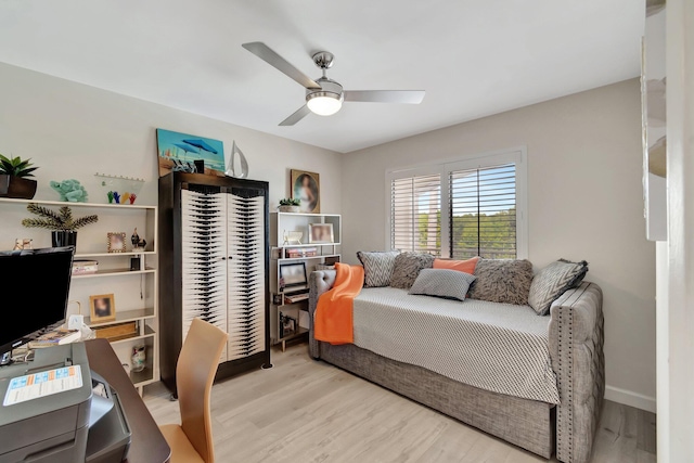 bedroom featuring ceiling fan and light hardwood / wood-style flooring