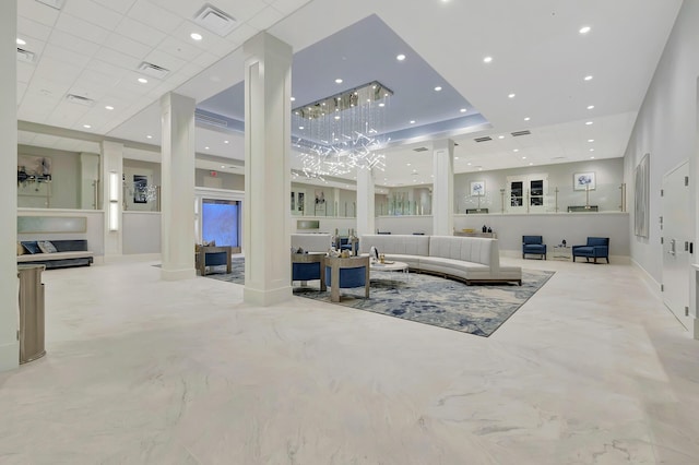 living room featuring decorative columns