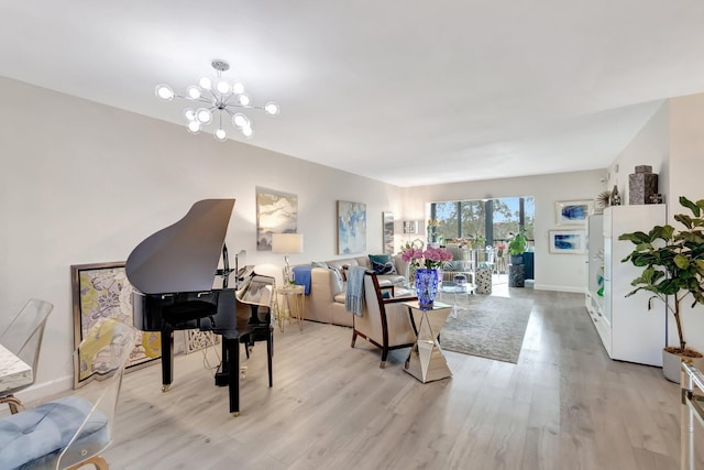 interior space featuring an inviting chandelier and light wood-type flooring