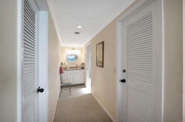 corridor featuring ornamental molding