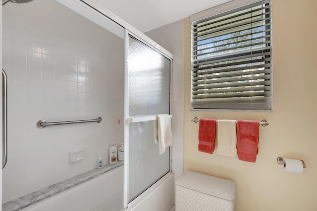 bathroom featuring enclosed tub / shower combo