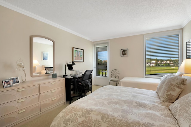 carpeted bedroom featuring crown molding and a textured ceiling