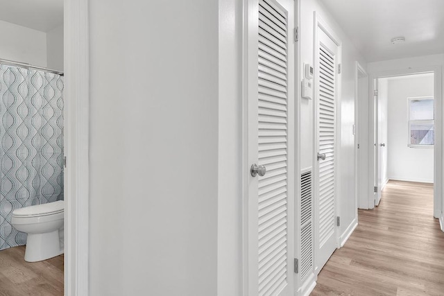 hall featuring light wood-type flooring