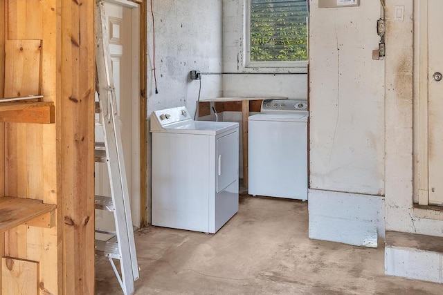 laundry area with independent washer and dryer