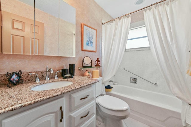 full bathroom featuring vanity, toilet, and shower / bath combo with shower curtain