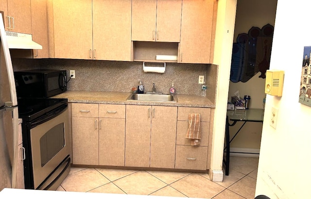 kitchen with sink, appliances with stainless steel finishes, light tile patterned flooring, decorative backsplash, and light brown cabinets