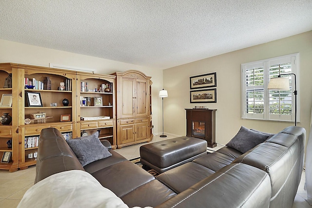 tiled living room with a textured ceiling