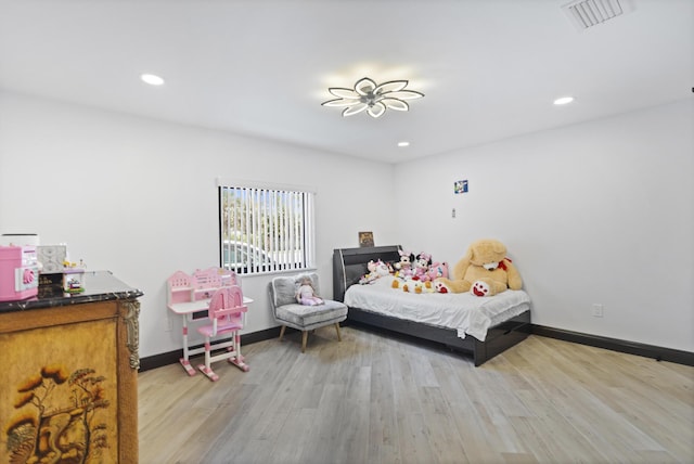 bedroom featuring light hardwood / wood-style flooring