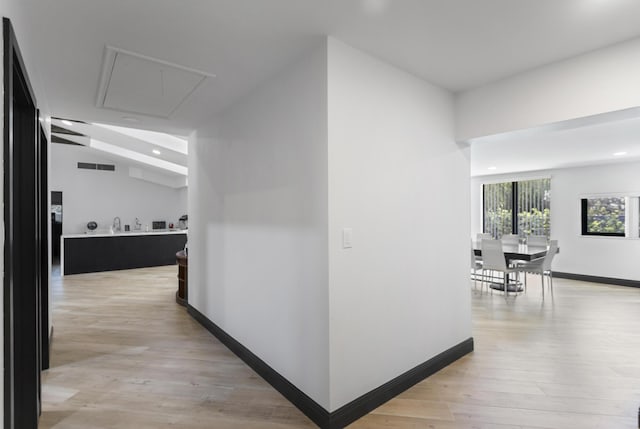 hallway featuring light hardwood / wood-style flooring