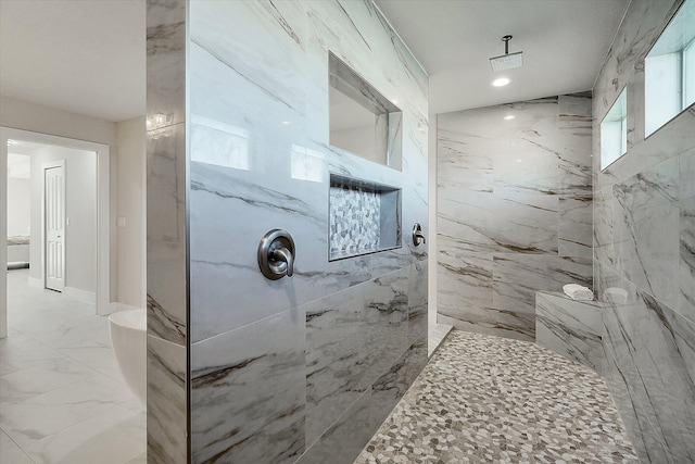 bathroom featuring a tile shower