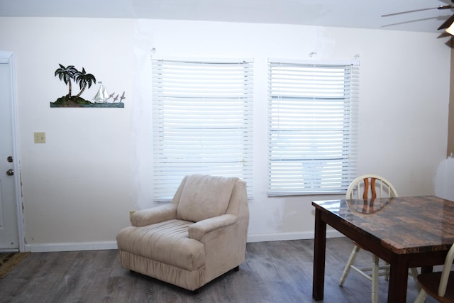 office area featuring dark wood-type flooring and ceiling fan