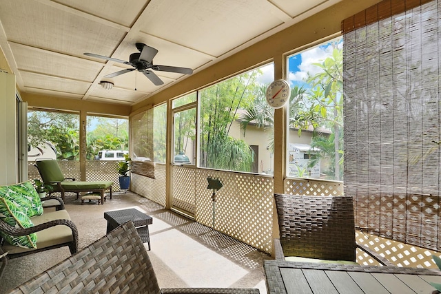 sunroom / solarium with ceiling fan