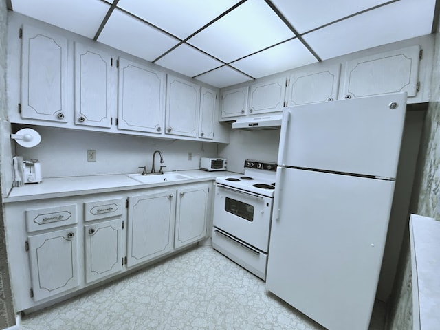 kitchen with white appliances and sink