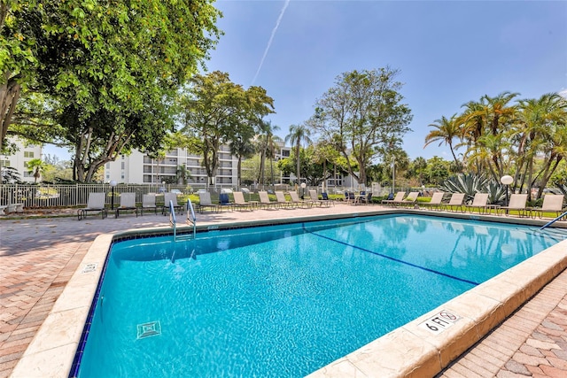 view of swimming pool featuring a patio