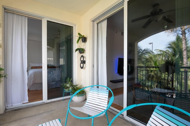 balcony featuring ceiling fan