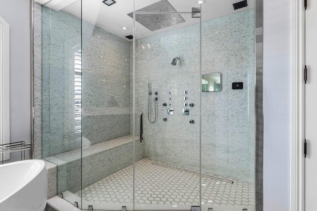 bathroom featuring plus walk in shower