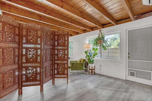 foyer with hardwood / wood-style flooring, wooden ceiling, and beamed ceiling