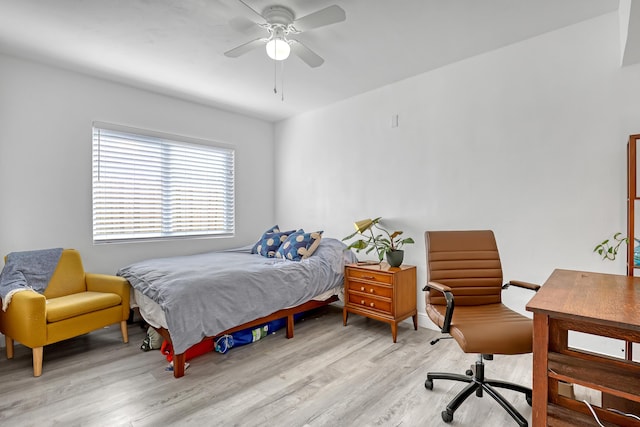 bedroom featuring ceiling fan and light hardwood / wood-style floors