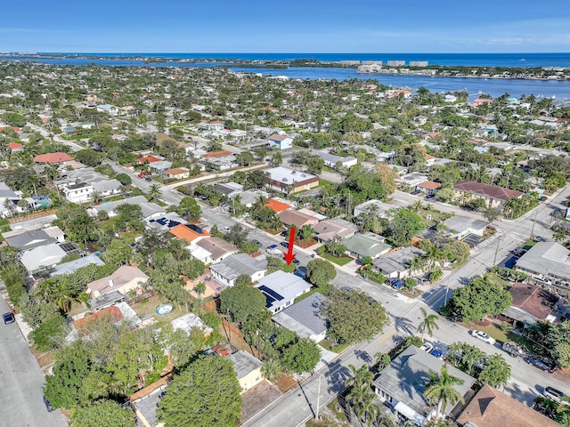 drone / aerial view featuring a water view