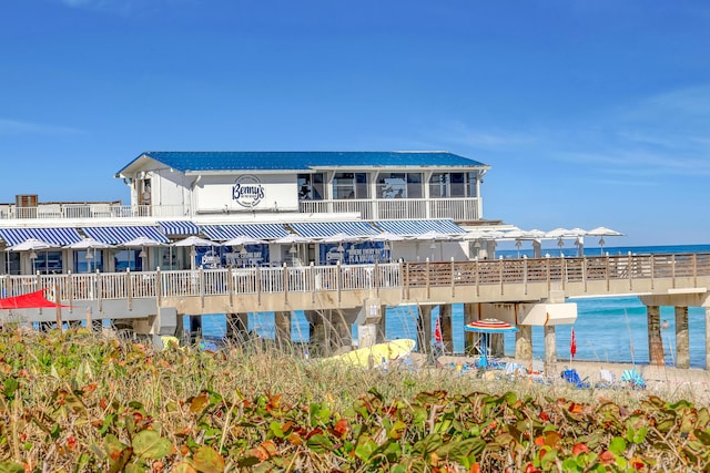 view of building exterior featuring a water view