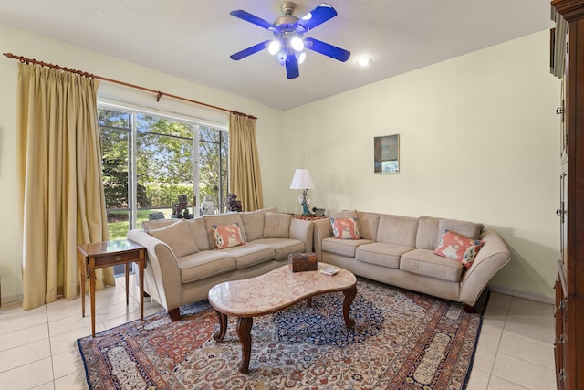 living room with ceiling fan and light tile patterned floors