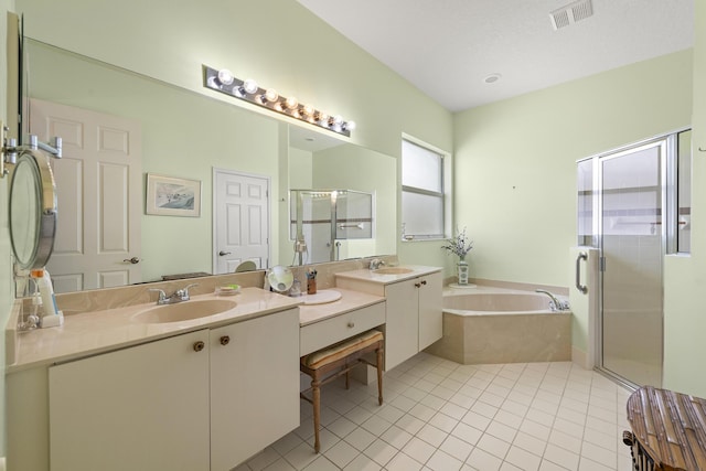 bathroom with vanity, separate shower and tub, and tile patterned flooring