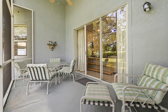 exterior space featuring ceiling fan