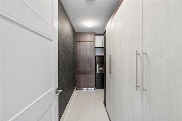 hallway with light tile patterned floors