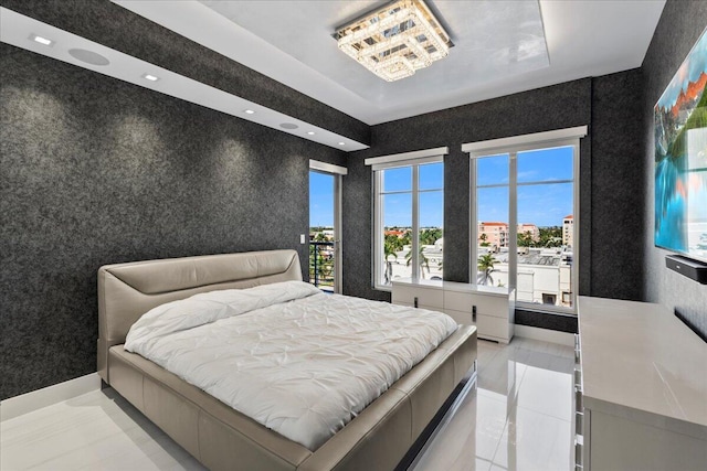 bedroom featuring a raised ceiling