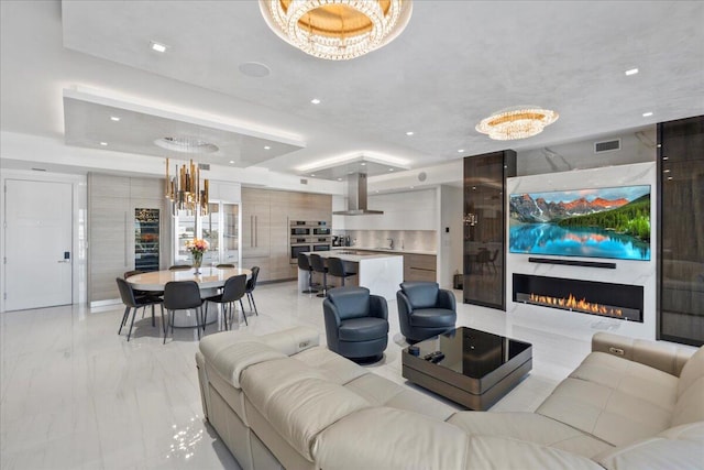 living room with a tray ceiling