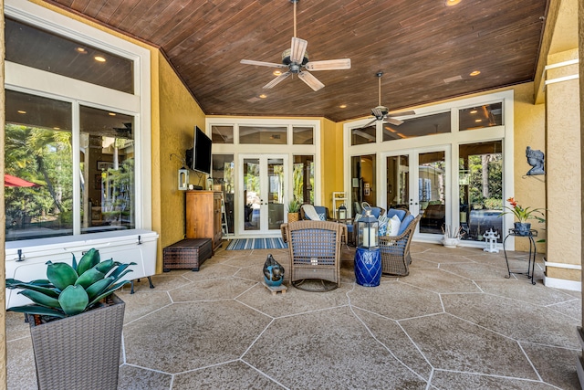 view of patio featuring ceiling fan and french doors