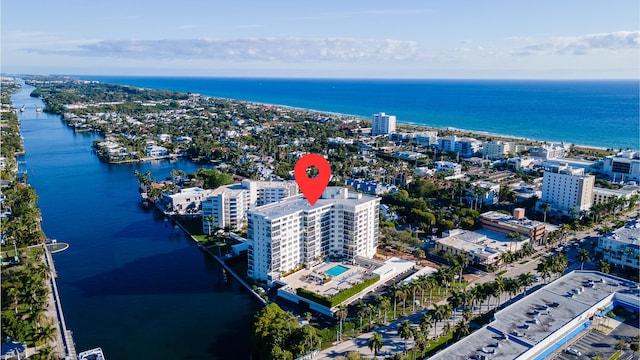 birds eye view of property featuring a water view