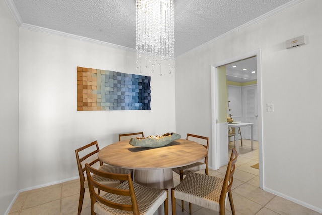 tiled dining room with crown molding, a chandelier, and a textured ceiling