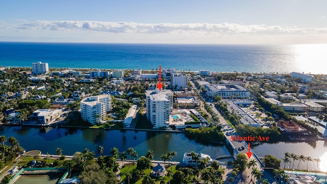 drone / aerial view with a water view