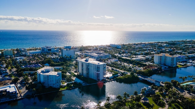 bird's eye view featuring a view of city and a water view
