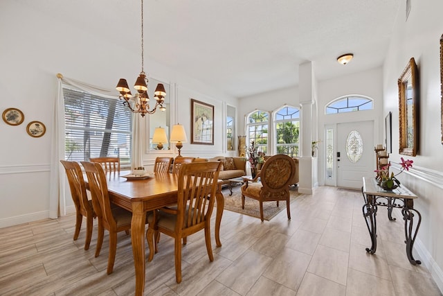 dining space featuring an inviting chandelier