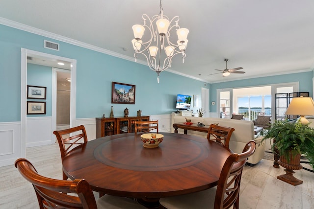 dining area with crown molding, ceiling fan, and light hardwood / wood-style floors