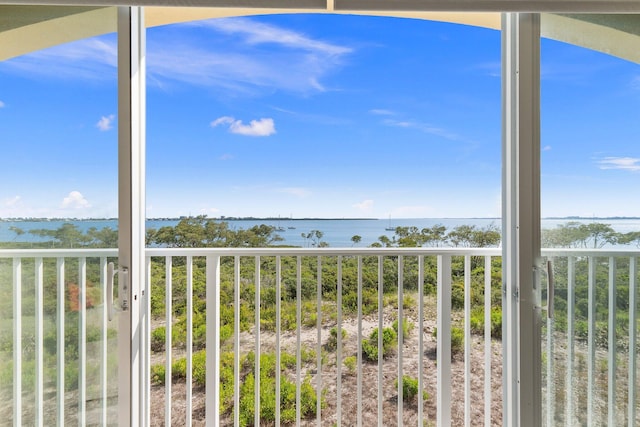 balcony featuring a water view