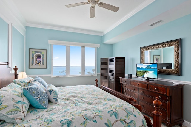 bedroom with crown molding and ceiling fan