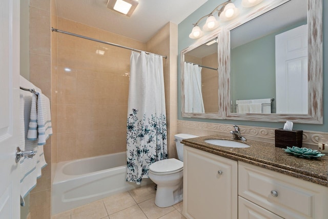 full bathroom with tile patterned flooring, vanity, shower / tub combo, and toilet