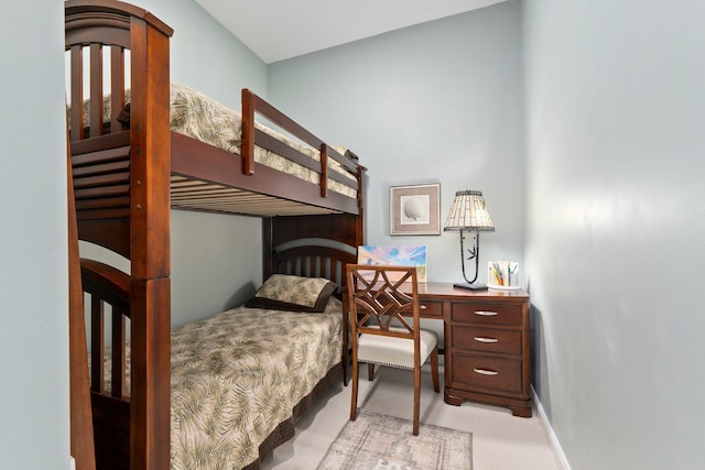 bedroom with light carpet